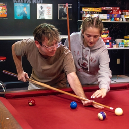 Students playing pool.
