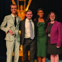 four students holding awards